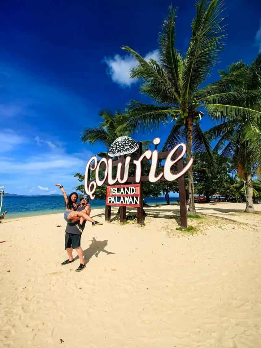Cowrie Island beach sign in Honda Bay, Puerto Princesa