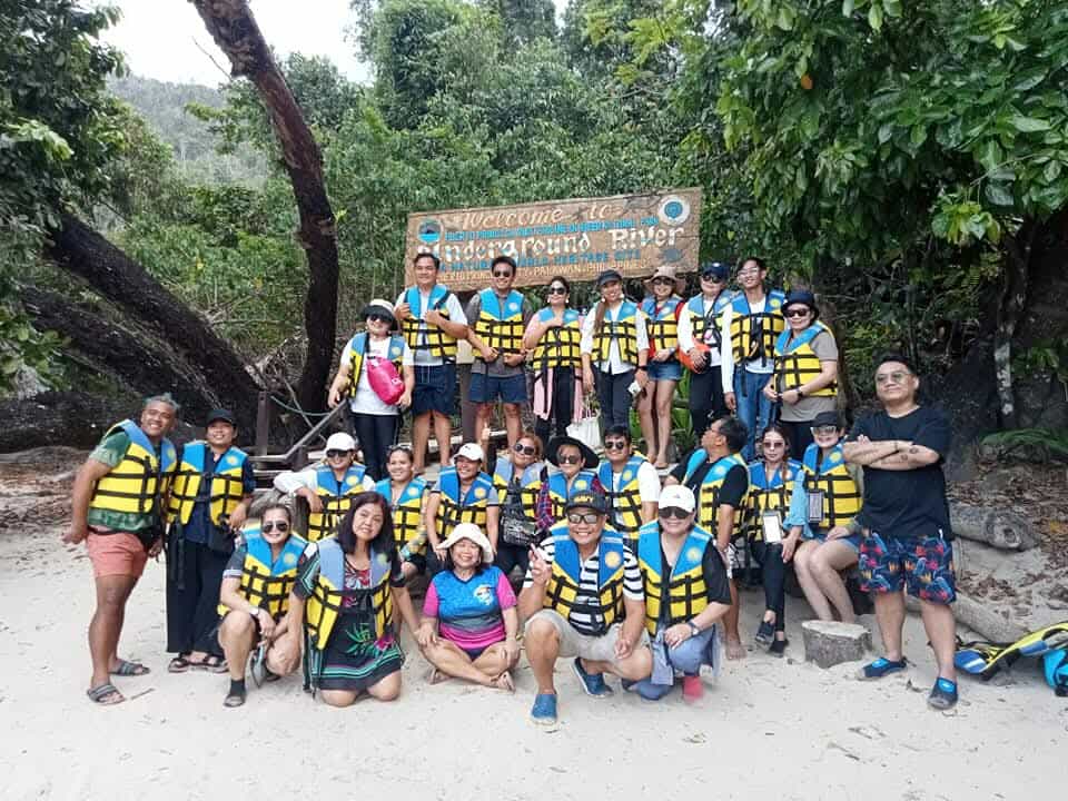 Group photo at the Puerto Princesa Underground River welcome sign