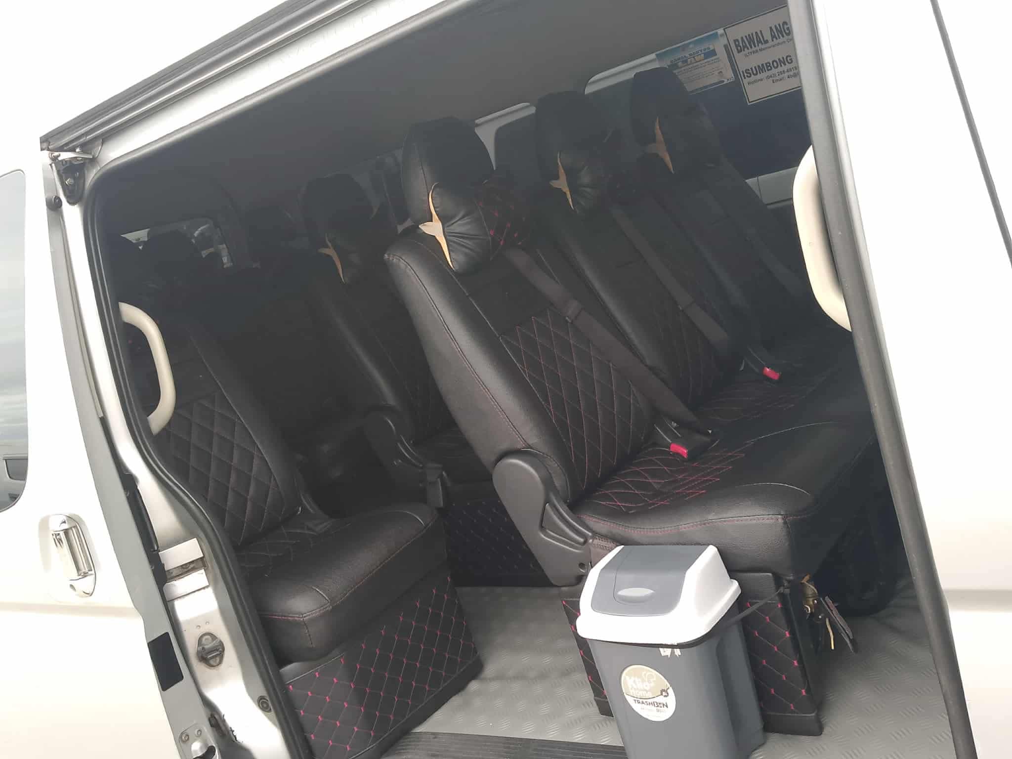 Quilted black leather seats inside the van — clean interior for the 5-hour transfer