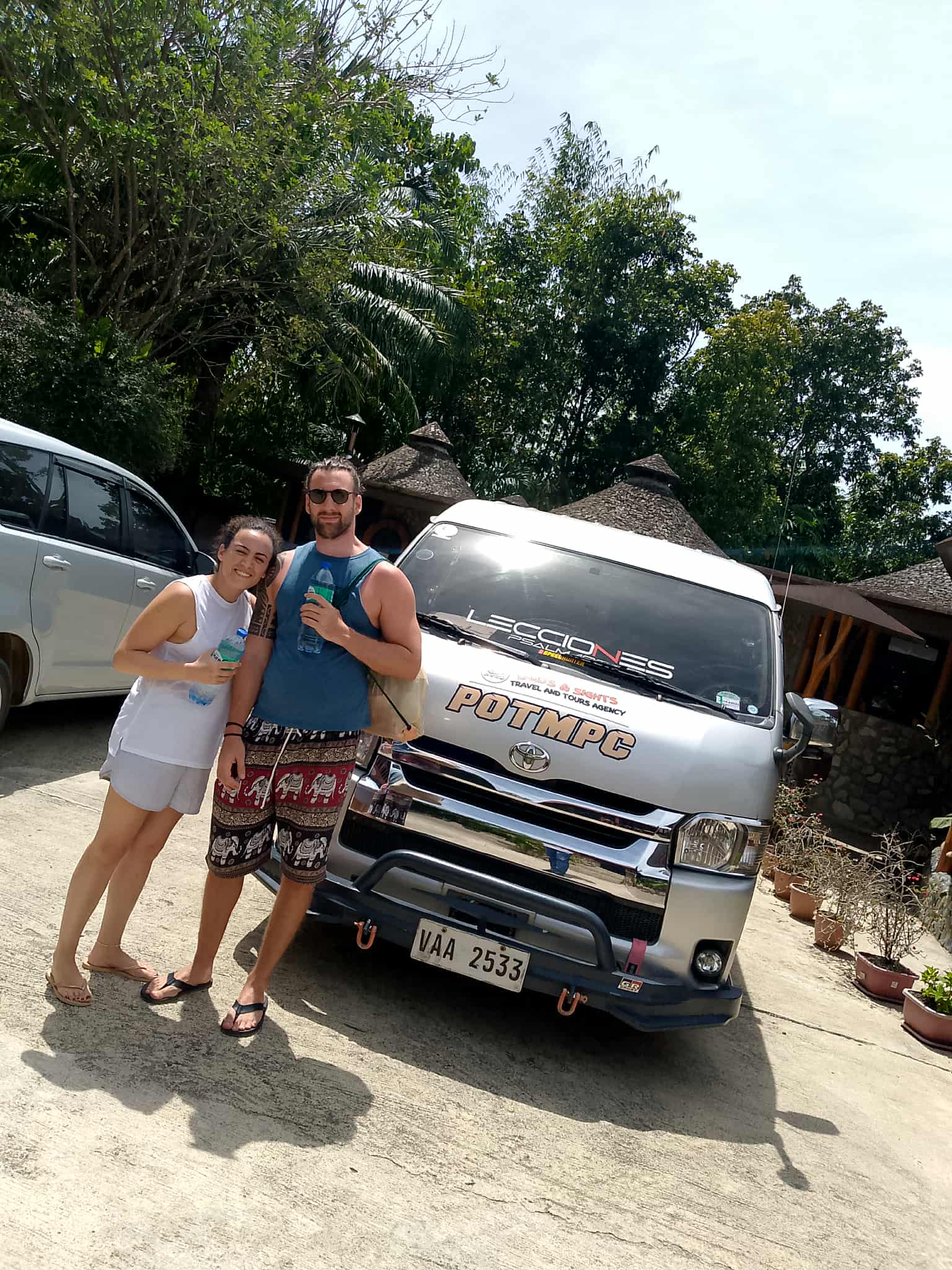 Couple arriving at Puerto Princesa Airport before a private transfer to El Nido