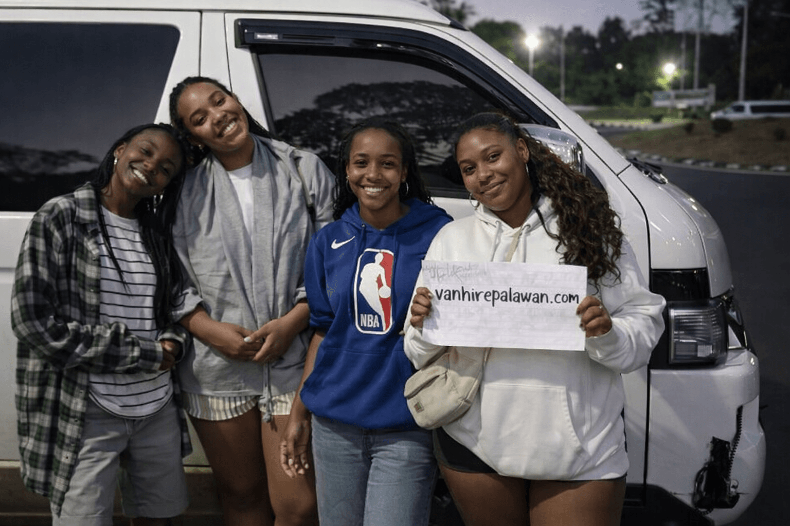 Family guests with their private transfer van in Puerto Princesa